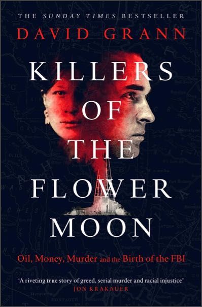 Cover of ‘Killers of the Flower Moon’ by David Grann. Image shows blended image of Native American woman at left and profile of a Caucasian man at right, all against a dark background.